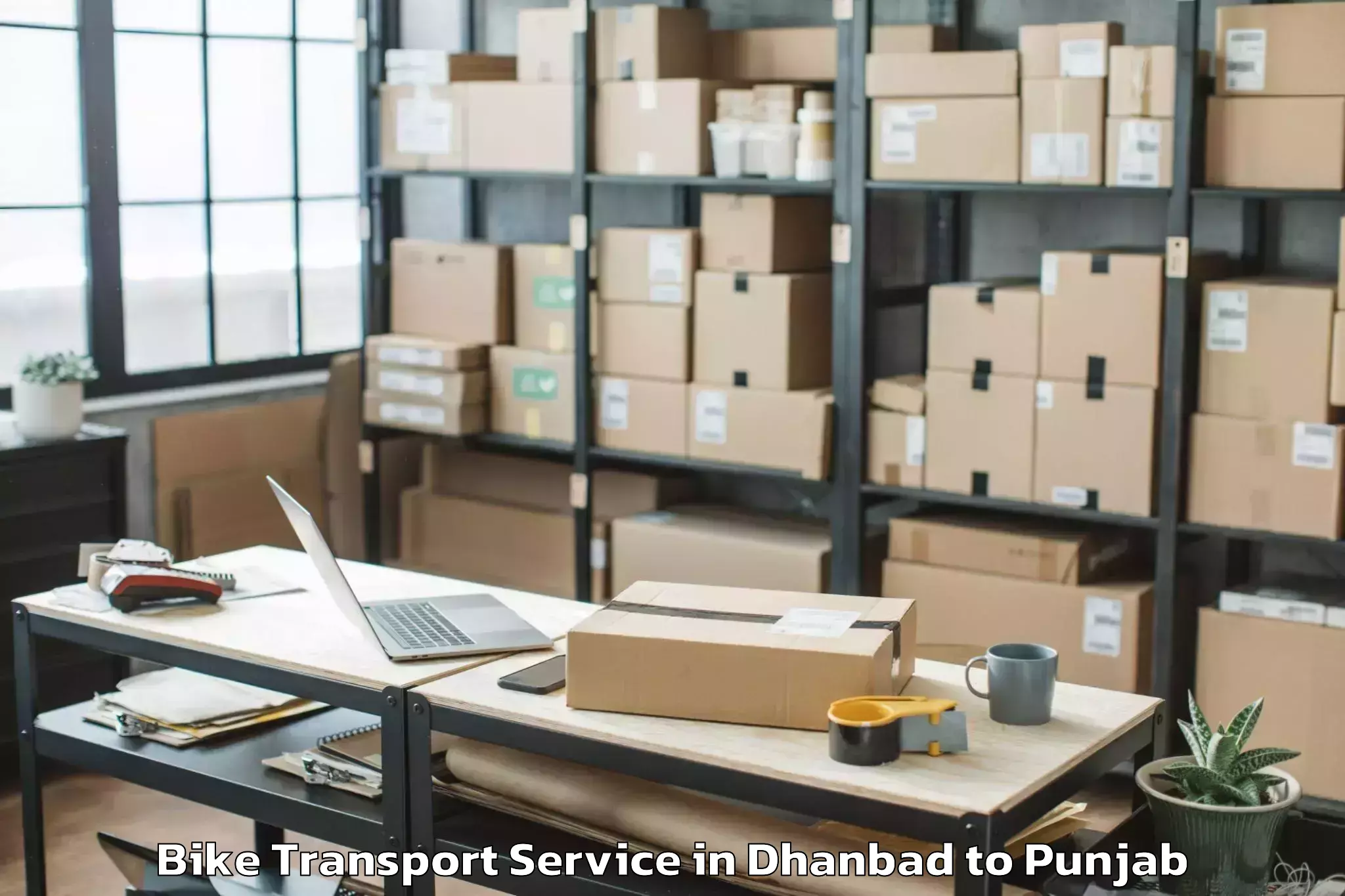 Book Dhanbad to Sunam Bike Transport Online